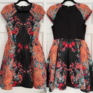 Bebe size 6 embroidered dress
